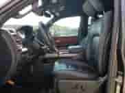 2023 Ram 1500 Rebel with VIN 1C6SRFLT8PN590542, listed as a Copart auction lot 70011115 with 27,609 mi miles and Salvage title. Bid and sale history available at DreamBid. Image 7.