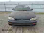 1993 Toyota Camry with VIN 4T1VK12E3PU067706, listed as a Copart auction lot 84291474 with 124,135 mi miles and Clean title. Bid and sale history available at DreamBid. Image 5.