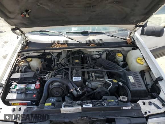 1996 Jeep Grand Cherokee with VIN 1J4EZ58S4TC151483, listed as a Copart auction lot 54982455 with Not provided miles and Salvage title. Bid and sale history available at DreamBid. Image 12.