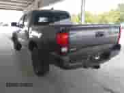 2023 Toyota Tacoma SR5 z VIN 3TMAZ5CN4PM206492, wystawiony jako IAAI lot #43245492 z przebiegiem 38 089 mil mil oraz . Historia ofert i sprzedaży dostępna na DreamBid. Obrazek 3.
