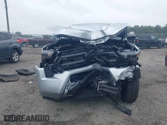 2024 Toyota Tacoma SR with VIN 3TYJDAHN7RT010103, listed as a IAAI auction lot 43009091 with 10,678 mi miles and . Bid and sale history available at DreamBid. Image 12.