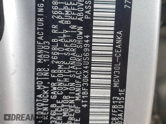 2004 Toyota Camry LE z VIN 4T1BF30KX4U569944, wystawiony jako Copart lot #81707915 z przebiegiem 246 068 mil mil oraz Szkoda całkowita • Salvage title. Historia ofert i sprzedaży dostępna na DreamBid. Obrazek 12.