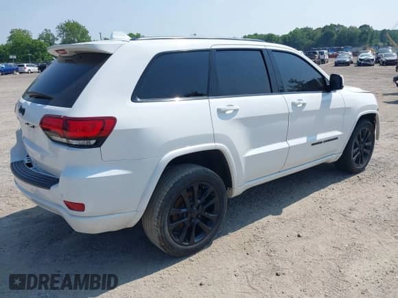 2020 Jeep Grand Cherokee Altitude with VIN 1C4RJFAG9LC196252, listed as a IAAI auction lot 42413963 with 100,856 mi miles and . Bid and sale history available at DreamBid. Image 4.