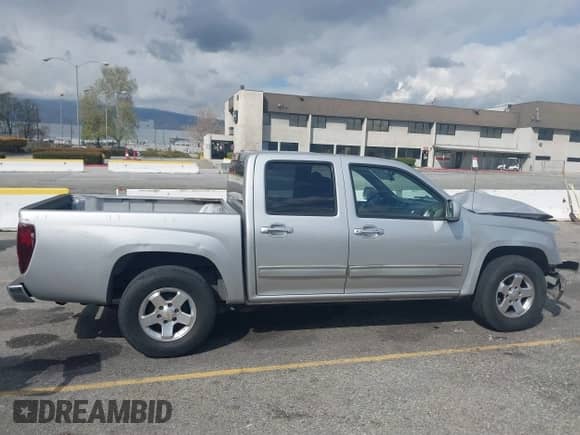 2010 Chevrolet Colorado 1LT z VIN 1GCDSCDE5A8148912, wystawiony jako IAAI lot #41752099 z przebiegiem Nie podano mil oraz . Historia ofert i sprzedaży dostępna na DreamBid. Obrazek 13.