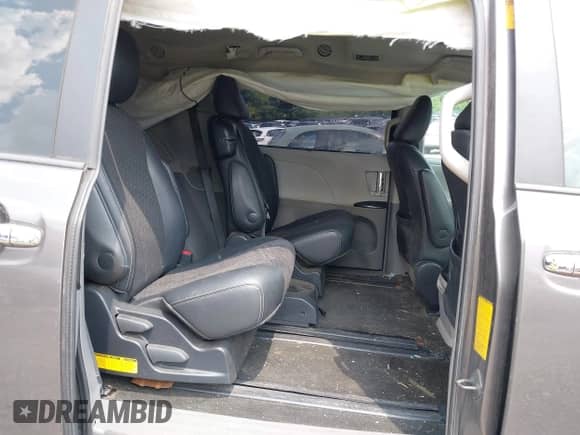 2014 Toyota Sienna SE with VIN 5TDXK3DC8ES440762, listed as a IAAI auction lot 42852260 with 191,156 mi miles and . Bid and sale history available at DreamBid. Image 8.