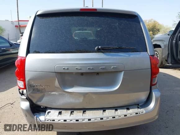 2016 Dodge Grand Caravan SE z VIN 2C4RDGBGXGR314799, wystawiony jako IAAI lot #42626257 z przebiegiem 164 785 mil mil oraz . Historia ofert i sprzedaży dostępna na DreamBid. Obrazek 16.
