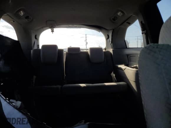 2016 Honda Odyssey LX z VIN 5FNRL5H27GB130385, wystawiony jako Copart lot #86176065 z przebiegiem 101 048 mil mil oraz Szkoda całkowita • Salvage title. Historia ofert i sprzedaży dostępna na DreamBid. Obrazek 10.