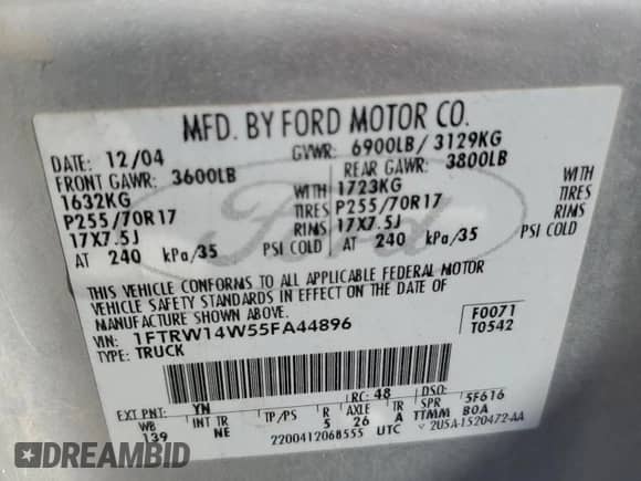 2005 Ford F-150 XLT with VIN 1FTRW14W55FA44896, listed as a Copart auction lot 71074945 with 284,443 mi miles and Salvage title. Bid and sale history available at DreamBid. Image 12.