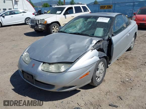 2002 Saturn SC with VIN 1G8ZY12722Z243236, listed as a IAAI auction lot 42464967 with 148,855 mi miles and . Bid and sale history available at DreamBid. Image 6.