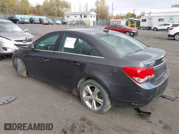 2014 Chevrolet Cruze 2LT z VIN 1G1PE5SB0E7422014, wystawiony jako IAAI lot #43512602 z przebiegiem 126 007 mil mil oraz . Historia ofert i sprzedaży dostępna na DreamBid. Obrazek 3.