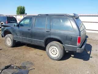 1991 Chevrolet Blazer z VIN 1GNDT13Z9M2200353, wystawiony jako IAAI lot #42747066 z przebiegiem 145 333 mil mil oraz . Historia ofert i sprzedaży dostępna na DreamBid. Obrazek 3.