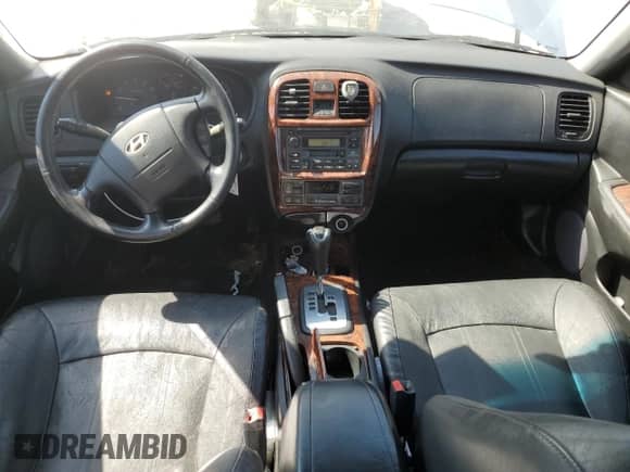 2002 Hyundai Sonata GLS with VIN KMHWF35H62A595535, listed as a Copart auction lot 68126284 with 245,493 mi miles and Clean title. Bid and sale history available at DreamBid. Image 8.