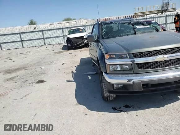 2011 Chevrolet Colorado 2LT with VIN 1GCHSDFE5B8131243, listed as a Copart auction lot 52133755 with 123,572 mi miles and Salvage title. Bid and sale history available at DreamBid. Image 11.