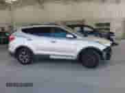 2014 Hyundai Santa Fe с VIN 5XYZU3LB1EG186577, выставлен на аукционе IAAI как лот 43011637 с пробегом 188 209 миль миль и . История ставок и продаж доступна на DreamBid. Изображение 14.