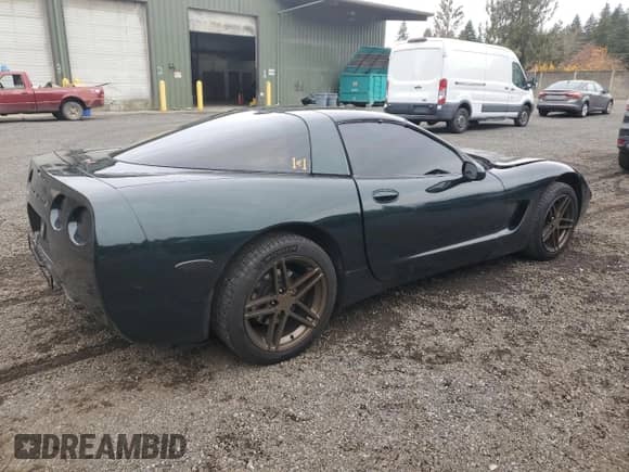 2001 Chevrolet Corvette с VIN 1G1YY22G215104259, выставлен на аукционе Copart как лот 89534305 с пробегом 62 091 миль миль и Списание • Salvage title. История ставок и продаж доступна на DreamBid. Изображение 3.