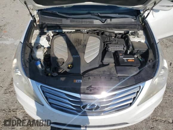 2014 Hyundai Azera Limited с VIN KMHFH4JG8EA372978, выставлен на аукционе Copart как лот 67515734 с пробегом 150 822 миль миль и Списание • Salvage title. История ставок и продаж доступна на DreamBid. Изображение 11.