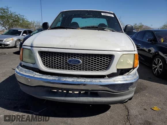 2004 Ford F-150 XL z VIN 2FTRX17204CA03494, wystawiony jako Copart lot #59884165 z przebiegiem 226 973 mil mil oraz Szkoda całkowita • Salvage title. Historia ofert i sprzedaży dostępna na DreamBid. Obrazek 5.