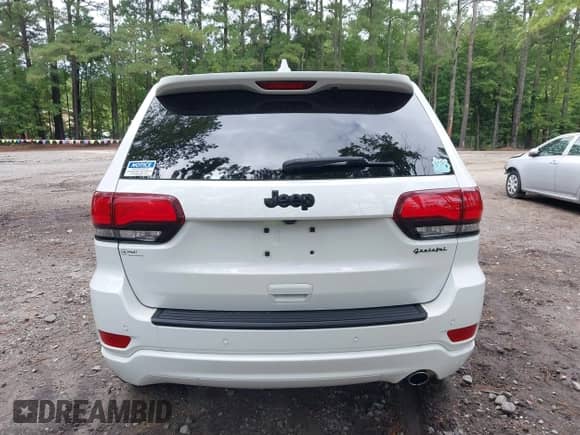2021 Jeep Grand Cherokee Laredo E with VIN 1C4RJEAG3MC550990, listed as a IAAI auction lot 43031989 with 54,774 mi miles and . Bid and sale history available at DreamBid. Image 16.