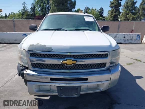 2012 Chevrolet Silverado 1500 LS z VIN 3GCPCREA5CG195542, wystawiony jako IAAI lot #42394304 z przebiegiem 246 628 mil mil oraz . Historia ofert i sprzedaży dostępna na DreamBid. Obrazek 13.