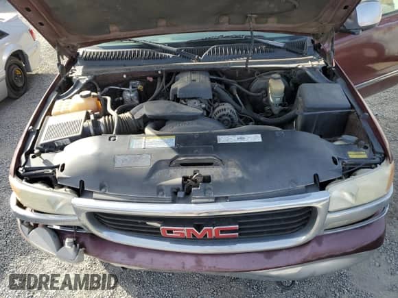 2000 GMC Sierra 1500 SLE with VIN 1GTEK19T1YE253734, listed as a Copart auction lot 42458225 with 197,956 mi miles and Salvage title. Bid and sale history available at DreamBid. Image 11.