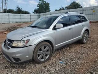 2012 Dodge Journey Crew with VIN 3C4PDDDG7CT224584, listed as a Copart auction lot 80711255 with 143,861 mi miles and Salvage title. Bid and sale history available at DreamBid. Image 1.