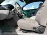 1996 Ford Mustang z VIN 1FALP4041TF206244, wystawiony jako Copart lot #56311934 z przebiegiem 123 572 mil mil oraz Szkoda całkowita • Salvage title. Historia ofert i sprzedaży dostępna na DreamBid. Obrazek 7.