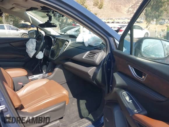 2024 Subaru Ascent Touring with VIN 4S4WMAWD1R3401854, listed as a IAAI auction lot 43304735 with 27,623 mi miles and . Bid and sale history available at DreamBid. Image 5.