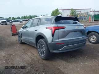 2024 Chevrolet Blazer EV eAWD LT z VIN 3GNKDBRJ0RS277894, wystawiony jako IAAI lot #42622339 z przebiegiem 5 034 mil mil oraz . Historia ofert i sprzedaży dostępna na DreamBid. Obrazek 3.