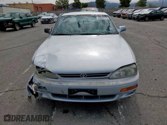 1995 Toyota Camry LE z VIN JT2GK12E7S0111308, wystawiony jako Copart lot #66548415 z przebiegiem 237 050 mil mil oraz Szkoda całkowita • Salvage title. Historia ofert i sprzedaży dostępna na DreamBid. Obrazek 5.