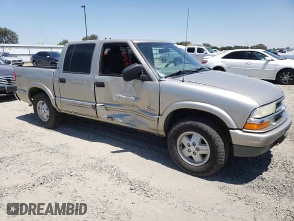 2004 Chevrolet S-10 LS z VIN 1GCDT13X14K113828, wystawiony jako Copart lot #64229655 z przebiegiem 100 013 mil mil oraz Szkoda całkowita • Salvage title. Historia ofert i sprzedaży dostępna na DreamBid. Obrazek 4.