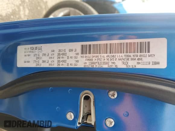 2018 Ram 1500 Sport z VIN 1C6RR6MT8JS195802, wystawiony jako Copart lot #83494094 z przebiegiem 56 990 mil mil oraz Szkoda całkowita • Salvage title. Historia ofert i sprzedaży dostępna na DreamBid. Obrazek 14.