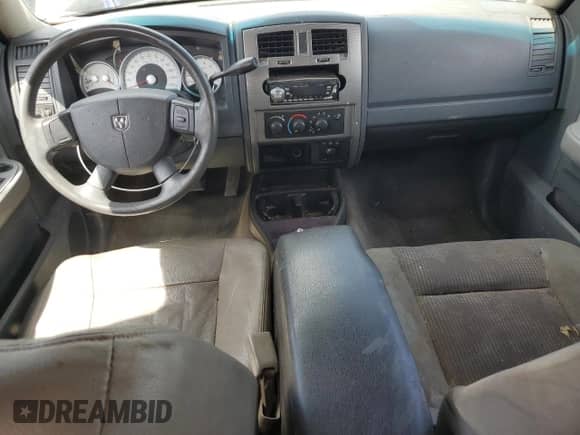 2007 Dodge Dakota SLT z VIN 1D7HW48J47S162496, wystawiony jako Copart lot #56791495 z przebiegiem 212 633 mil mil oraz Szkoda całkowita • Salvage title. Historia ofert i sprzedaży dostępna na DreamBid. Obrazek 8.