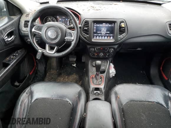 2019 Jeep Compass Trailhawk with VIN 3C4NJDDB7KT671080, listed as a Copart auction lot 60645655 with 131,581 mi miles and Salvage title. Bid and sale history available at DreamBid. Image 8.