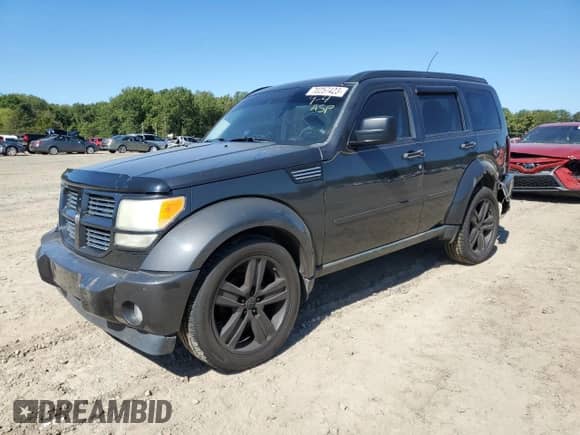 2011 Dodge Nitro Heat z VIN 1D4PT4GK5BW589795, wystawiony jako Copart lot #70257423 z przebiegiem 140 599 mil mil oraz Szkoda całkowita • Salvage title. Historia ofert i sprzedaży dostępna na DreamBid. Obrazek 1.