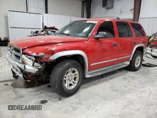 2002 Dodge Durango with VIN 1B4HS58Z82F200697, listed as a Copart auction lot 89383025 with 120,713 mi miles and Salvage title. Bid and sale history available at DreamBid. Image 1.
