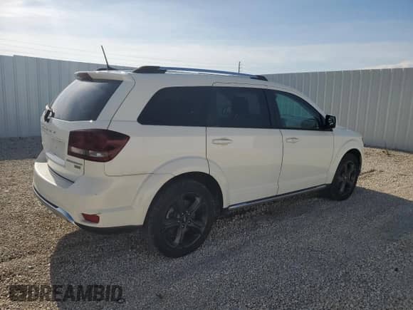 2019 Dodge Journey Crossroad z VIN 3C4PDCGG8KT700555, wystawiony jako Copart lot #70927135 z przebiegiem 94 792 mil mil oraz Czysty tytuł • Clean title. Historia ofert i sprzedaży dostępna na DreamBid. Obrazek 3.