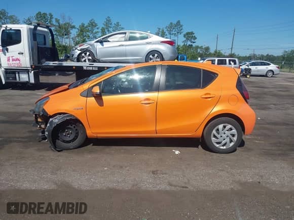 2015 Toyota Prius One z VIN JTDKDTB30F1095149, wystawiony jako IAAI lot #42846245 z przebiegiem 80 862 mil mil oraz . Historia ofert i sprzedaży dostępna na DreamBid. Obrazek 15.