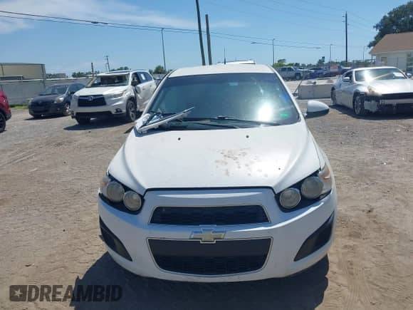 2012 Chevrolet Sonic LT z VIN 1G1JC6SB0C4206096, wystawiony jako IAAI lot #42799234 z przebiegiem 154 255 mil mil oraz . Historia ofert i sprzedaży dostępna na DreamBid. Obrazek 12.
