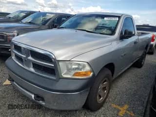 2010 Dodge 1500 ST with VIN 3D7JB1EP1AG177119, listed as a Copart auction lot 74556704 with 303,105 mi miles and Salvage title. Bid and sale history available at DreamBid. Image 1.