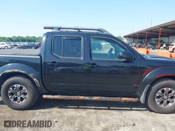 2016 Nissan Frontier S z VIN 1N6AD0EVXGN705086, wystawiony jako IAAI lot #42425274 z przebiegiem 110 614 mil mil oraz . Historia ofert i sprzedaży dostępna na DreamBid. Obrazek 14.
