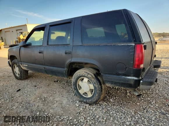 1998 Chevrolet Tahoe с VIN 1GNEK13R1WJ318252, выставлен на аукционе Copart как лот 86267815 с пробегом 248 020 миль миль и Списание • Salvage title. История ставок и продаж доступна на DreamBid. Изображение 2.