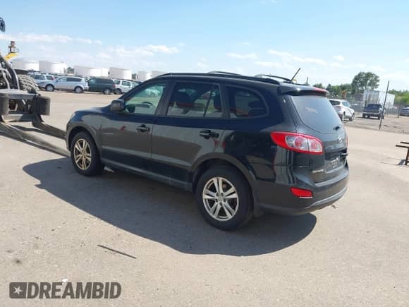 2012 Hyundai Santa Fe SE with VIN 5XYZHDAG8CG167966, listed as a IAAI auction lot 42901636 with 113,334 mi miles and . Bid and sale history available at DreamBid. Image 3.