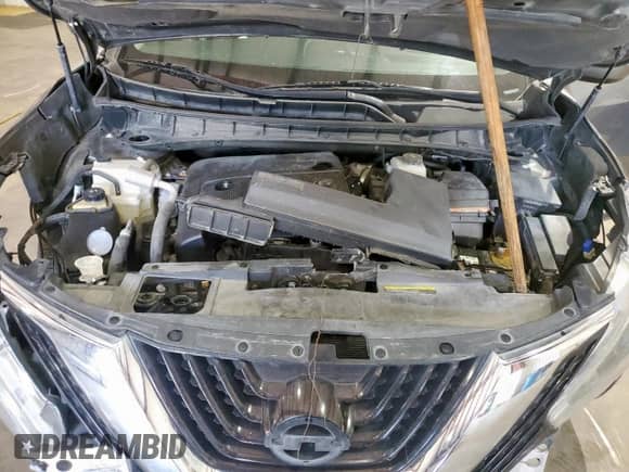 2018 Nissan Murano SV z VIN 5N1AZ2MG4JN171668, wystawiony jako Copart lot #81327635 z przebiegiem 123 779 mil mil oraz Szkoda całkowita • Salvage title. Historia ofert i sprzedaży dostępna na DreamBid. Obrazek 11.