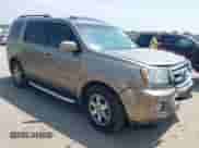 2009 Honda Pilot Touring with VIN 5FNYF38809B004142, listed as a IAAI auction lot 42337103 with 152,874 mi miles and . Bid and sale history available at DreamBid. Image 1.