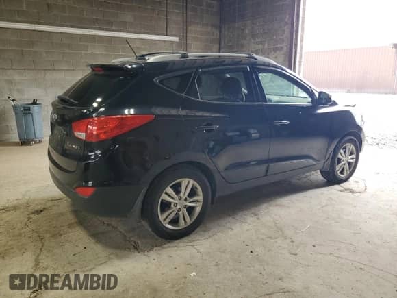 2013 Hyundai Tucson GLS with VIN KM8JU3AC6DU721792, listed as a Copart auction lot 85517455 with 48,753 mi miles and Salvage title. Bid and sale history available at DreamBid. Image 3.