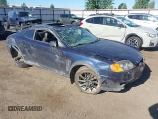 2005 Hyundai Tiburon GT с VIN KMHHN65F65U167737, выставлен на аукционе IAAI как лот 42776961 с пробегом 189 846 миль миль и . История ставок и продаж доступна на DreamBid. Изображение 1.