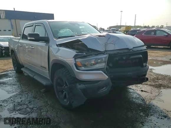 2022 Ram 1500 Rebel z VIN 1C6SRFLM8NN308373, wystawiony jako Copart lot #66814305 z przebiegiem 66 857 mil mil oraz Czysty tytuł • Clean title. Historia ofert i sprzedaży dostępna na DreamBid. Obrazek 13.