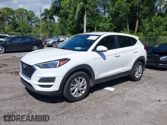 2021 Hyundai Tucson SE with VIN KM8J23A41MU318897, listed as a IAAI auction lot 43233832 with 112,924 mi miles and . Bid and sale history available at DreamBid. Image 2.