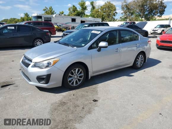 2012 Subaru Impreza Premium с VIN JF1GJAC61CH013711, выставлен на аукционе Copart как лот 71022595 с пробегом 140 853 миль миль и Списание • Salvage title. История ставок и продаж доступна на DreamBid. Изображение 1.