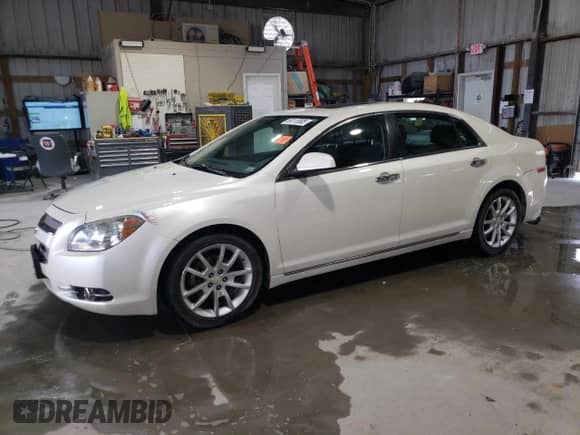 2011 Chevrolet Malibu LTZ with VIN 1G1ZE5E78BF399390, listed as a Copart auction lot 69113985 with 217,289 mi miles and Salvage title. Bid and sale history available at DreamBid. Image 1.